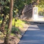У Кам’янському почали укладати асфальт на пішохідних доріжках у дворах на вулиці Грушевського